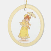 Petite fille avec ornement parapluie (Gauche)