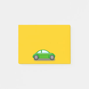 Petite voiture verte sur un Post-It jaune