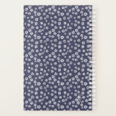 Petites fleurs blanches sur un planificateur bleu (Dos)