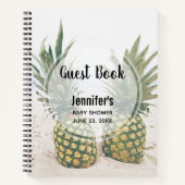 Photo de 2 ananas sur un livre d'or (Devant)