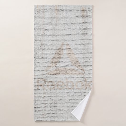 Photo de fond du logo de Reebok sur les murs (Serviette de bain)