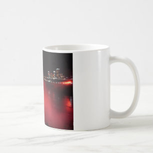 Photo de lumières rouges de nuit de tasse de caf