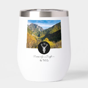Photo de monogramme de silhouette de cerf blanc ne
