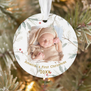 Photo de Noël de bébé avec feuilles de houx hivern
