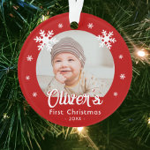 Photo des premiers flocons rouges de Noël du bébé