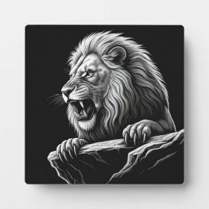 Photo Lion sur la plaque de la falaise avec l'Easel