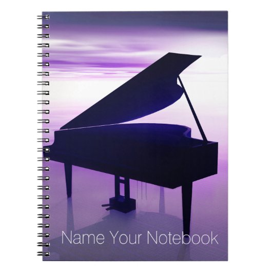 Piano à queue sur le carnet de musique de plage de (Devant)