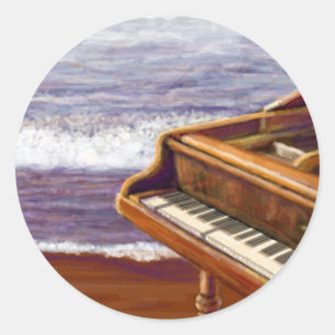 Piano op een strand ronde sticker