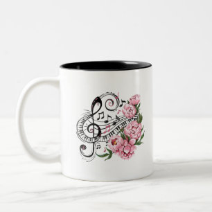 Pianosleutels en bloemen tweekleurige koffiemok