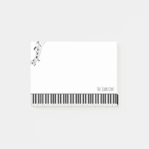 Pianotoetsenbord en muzieknotities post-it® notes