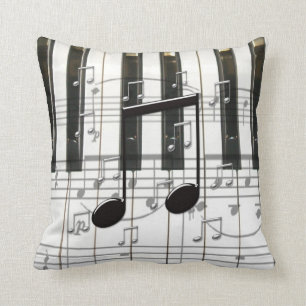 Pianotoetsenbord en notities kussen