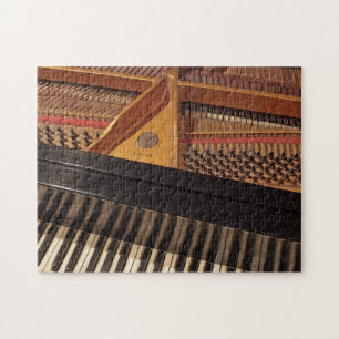 pianotoetsenbord en spelden legpuzzel