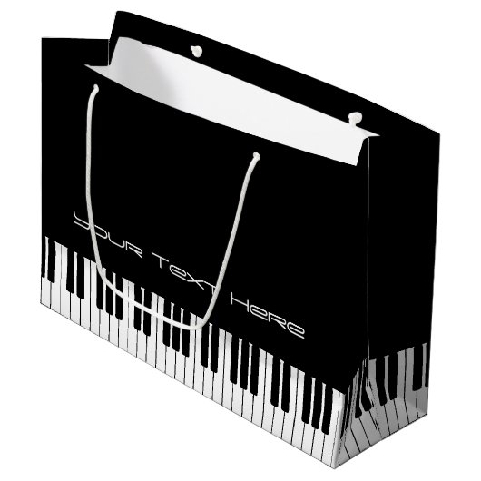 Pianotoetsenbord Organische tas met grote cadeaus Large Cadeauzakje (Voorkant Gekanteld)