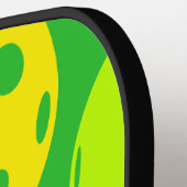 Pickleball Paddle met Pickleballs erop! (Links Detail)