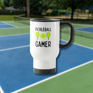 Pickleball-speler Paddles en Bal Reisbeker
