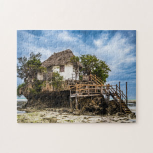Pictureskast op een tropisch koraal legpuzzel