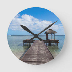 Pier in de oceaan flic en flac mauritius ronde klok