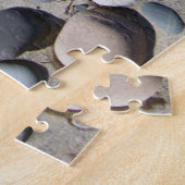 Pierres sur le puzzle de plage (Côté)