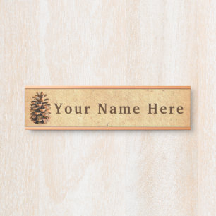 Pijnkloon op oud papier deurbordje