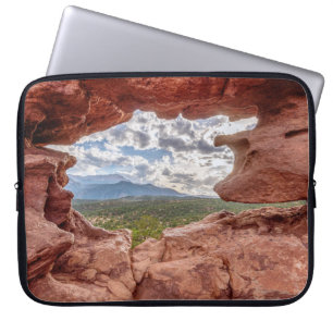 Pikes peak through a Rock Hole Laptop Sleeve