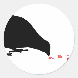 pikorde, zwarte vogel en rode harten. ronde sticker