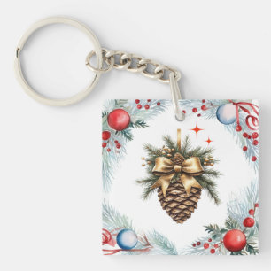 Pine kegel omgeven door krans en Ornamenten Sleutelhanger
