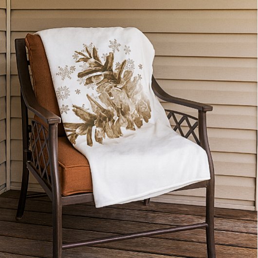 Pinecones rustiques dans la couverture en toison d