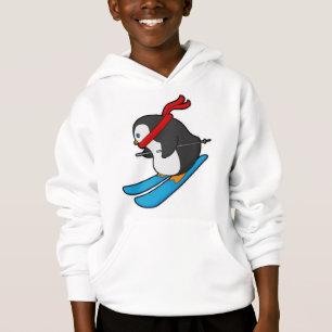 Pingouin comme skieur avec ski