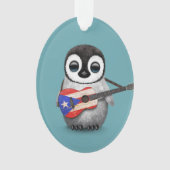 Pingouin de bébé jouant le bleu de guitare de (devant)
