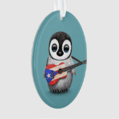 Pingouin de bébé jouant le bleu de guitare de (devant)