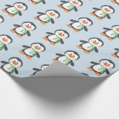 Pingouin mignon en papier cadeau bleu et vert (Coin)