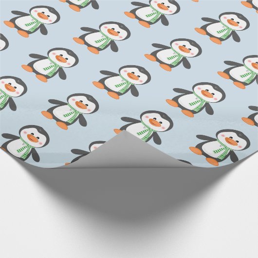 Pingouin mignon en papier cadeau bleu et vert (Coin)