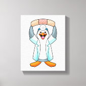 Pinguïn als arts met gips canvas afdruk (Voorkant)