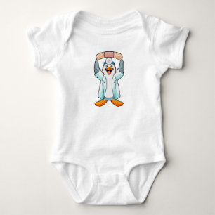Pinguïn als arts met gips romper