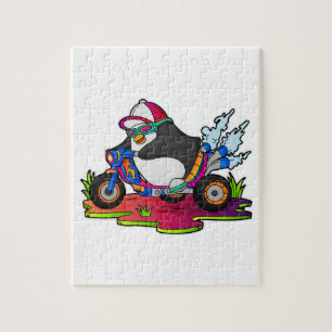 Pinguïn als fietser met motorfiets legpuzzel