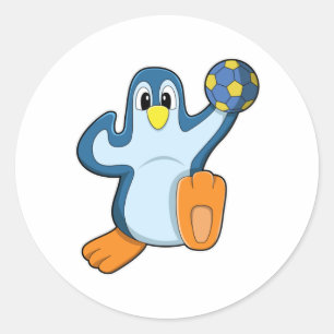 Pinguïn als handballspeler met handbal ronde sticker