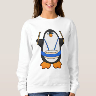 Pinguïn als muzikant met rum trui