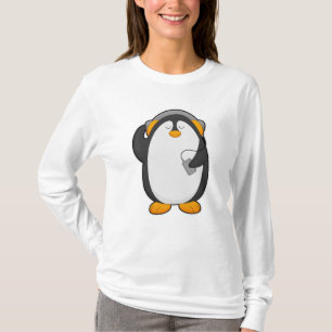 Pinguïn en mobiele telefoon met headset t-shirt