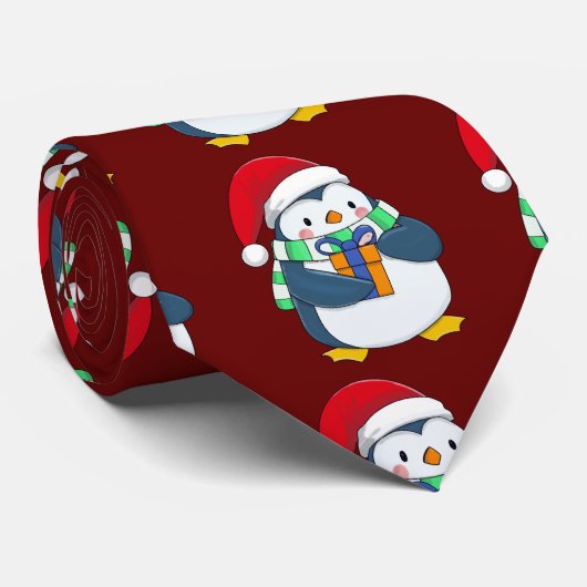 Pinguïn in een kerstpet met cadeau stropdas (Opgerold)