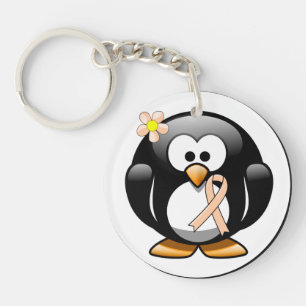 Pinguïn met perzikbewustzijnslint sleutelhanger