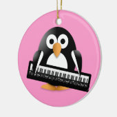 Pinguïn met piano keramisch ornament (Links)