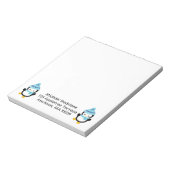 Pinguïns geperst voor winter met blokletst notitieblok (Gedraaid)