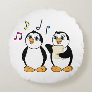 Pinguïns met muziek en notities zingen rond kussen