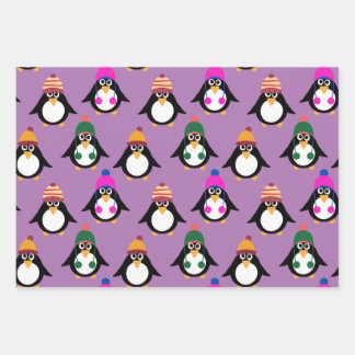 Pinguïns met winterpetten inpakpapier vel