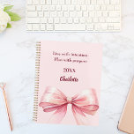 Pink bow quote 2026<br><div class="desc">A soft blush pink background, decorated with a large bow. Quote: Live with intention. Plan with purpose.</div>