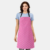 Pink polka dot apron with black straps, shown flat schort (Gedragen)