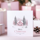 Pink Winter Cottage Noël Carte de voeux<br><div class="desc">Cette charmante carte de voeux de Noël présente une aquarelle douce illustrant un cottage rose niché au milieu de verdures enneigées et d'arbres d'hiver nus. L'élégant accueil "Joyeux Noël" est imprimé dans une délicate police serif, ajoutant une touche cosy et festive. Personnalisable avec un nom de famille et une date,...</div>