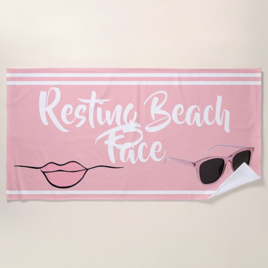 Plage de repos Face à la serviette de plage rose (Devant)