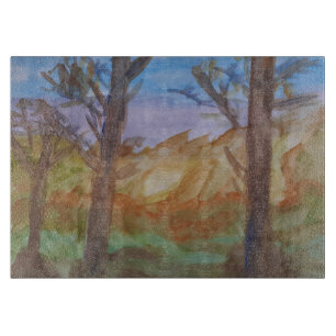 Planche À Découper Arbres au coucher du soleil