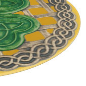 Planche à découper aux motifs de trèfle doré sur d (Coin)